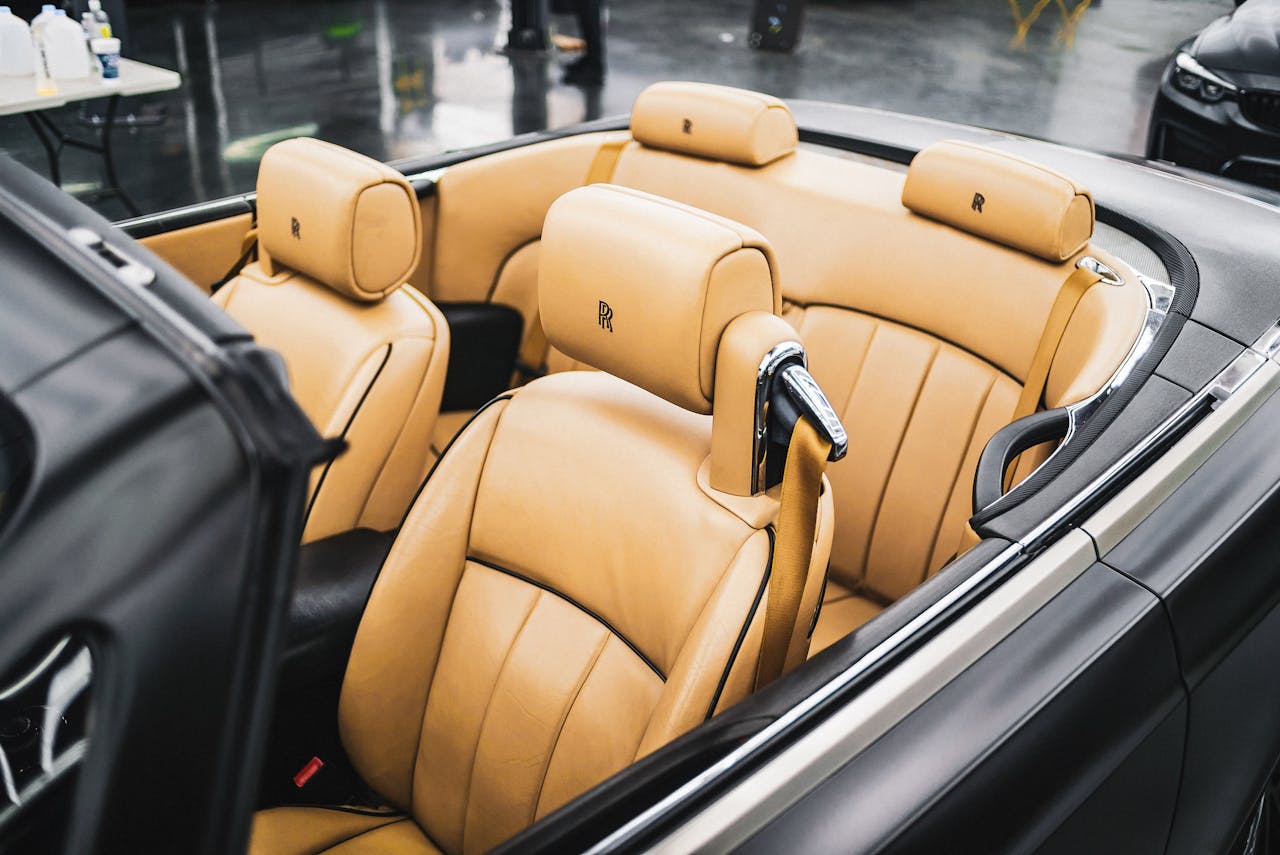 Explore the exquisite tan leather seats of an upscale convertible for ultimate comfort and style.